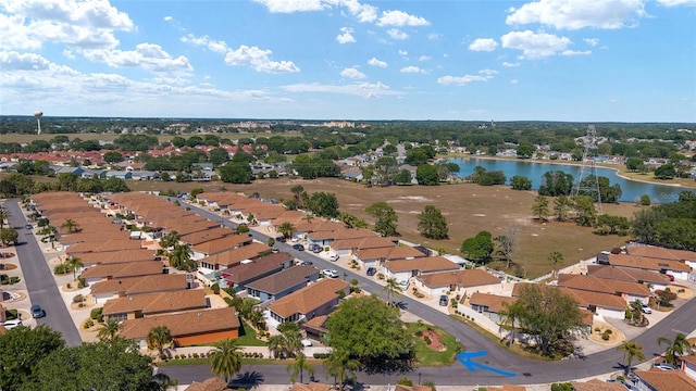 aerial view featuring a residential view and a water view