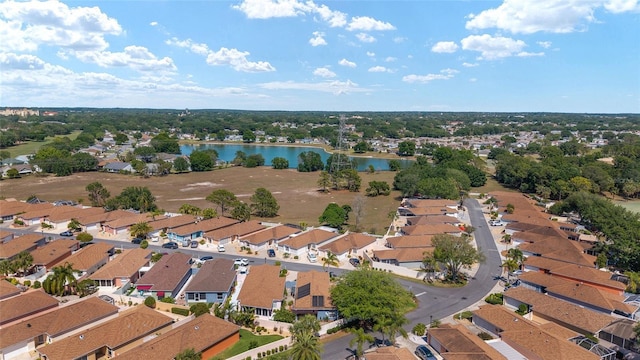 aerial view featuring a residential view and a water view
