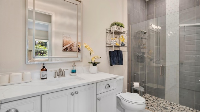 26516 Savage Cir, Howey In The Hills, FL 34737 - full bath featuring a stall shower, toilet, and vanity