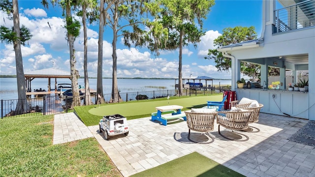26516 Savage Cir, Howey In The Hills, FL 34737 - view of patio featuring a putting green, a water view, and a gazebo