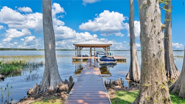 26516 Savage Cir, Howey In The Hills, FL 34737 - dock featuring a water view and boat lift