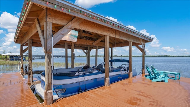 26516 Savage Cir, Howey In The Hills, FL 34737 - dock featuring boat lift and a water view