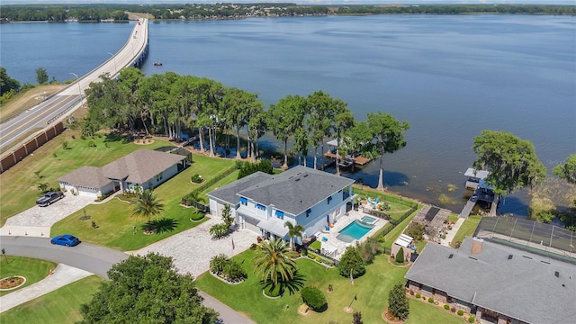 26516 Savage Cir, Howey In The Hills, FL 34737 - aerial view of property and surrounding area featuring a pool area and a large body of water