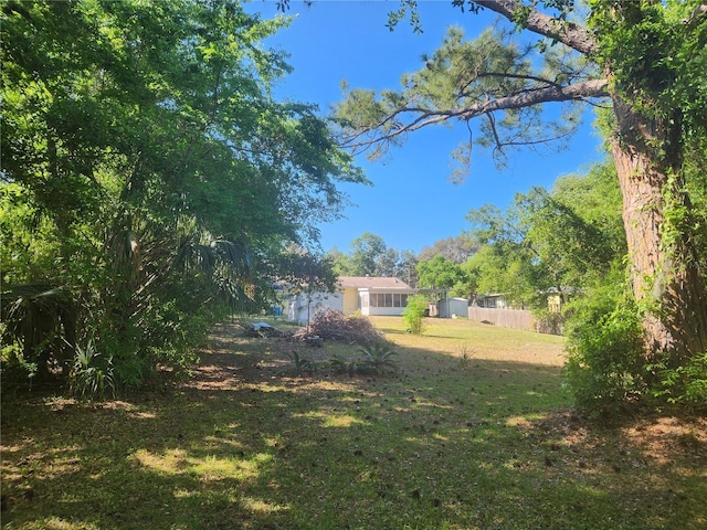 view of yard featuring fence