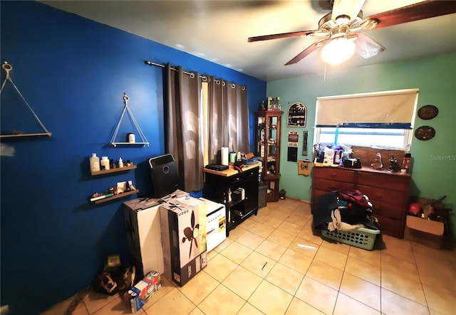 bedroom featuring light tile patterned floors and a ceiling fan