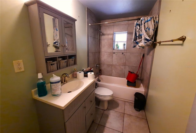 bathroom with vanity, toilet, tile patterned flooring, and shower / bath combo with shower curtain