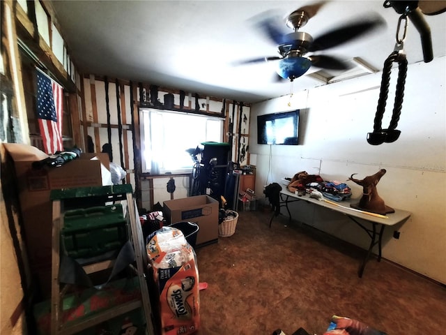 interior space featuring ceiling fan