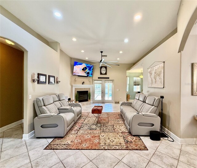 30554 Quince Ave, Eustis, FL 32736 - living room featuring a ceiling fan, light tile patterned floors, recessed lighting, and baseboards