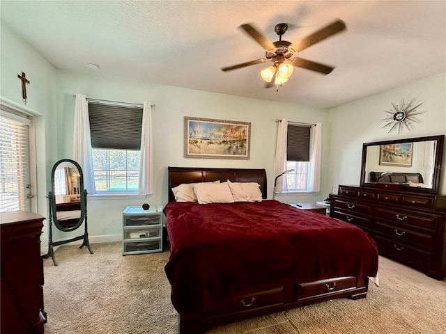 30554 Quince Ave, Eustis, FL 32736 - carpeted bedroom with baseboards and a ceiling fan