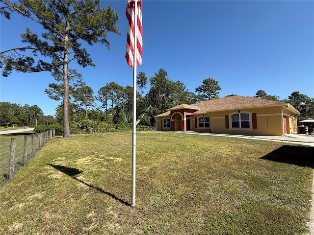 30554 Quince Ave, Eustis, FL 32736 - view of yard with an attached garage