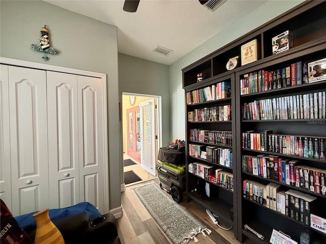 30554 Quince Ave, Eustis, FL 32736 - sitting room with wood finished floors and ceiling fan