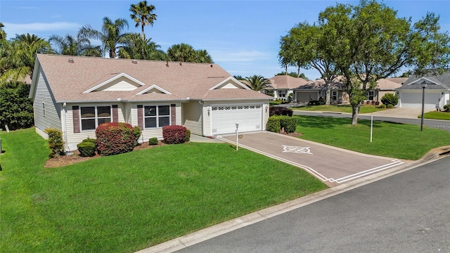 ranch-style house with an attached garage, a front lawn, driveway, and roof with shingles