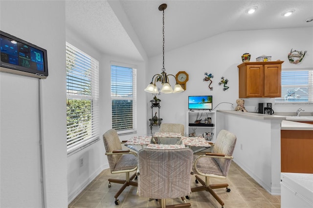 dining area with light tile patterned flooring, vaulted ceiling, baseboards, recessed lighting, and a chandelier