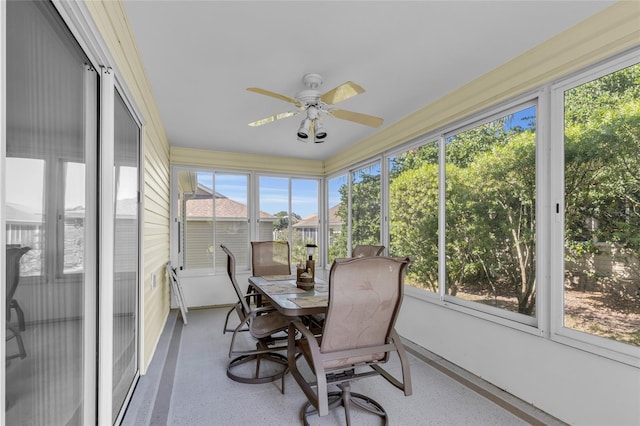 sunroom / solarium with ceiling fan
