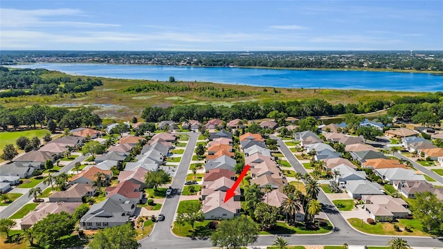 aerial view featuring a residential view and a water view