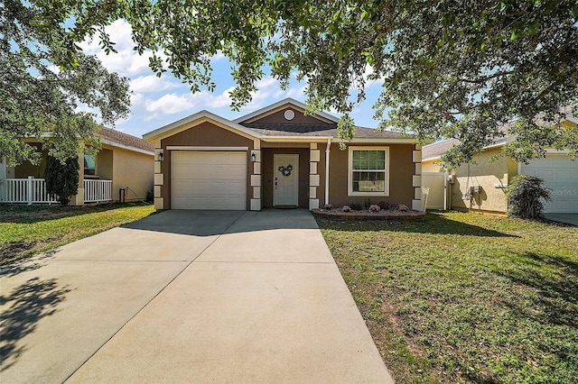 ranch-style house featuring fence, concrete driveway, stucco siding, a front lawn, and a garage