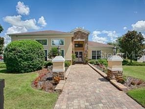 view of front of home featuring a front lawn