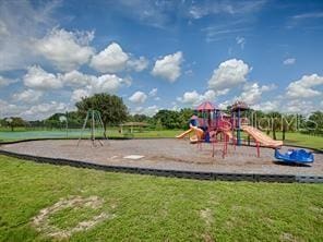 community play area with a yard