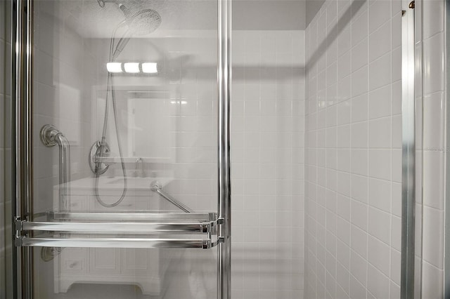 bathroom with a stall shower