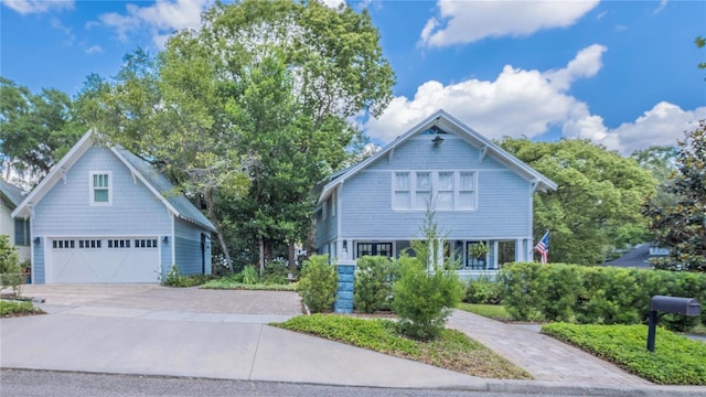908 N Tremain St, Mount Dora, FL 32757 - view of front of house featuring a garage and concrete driveway