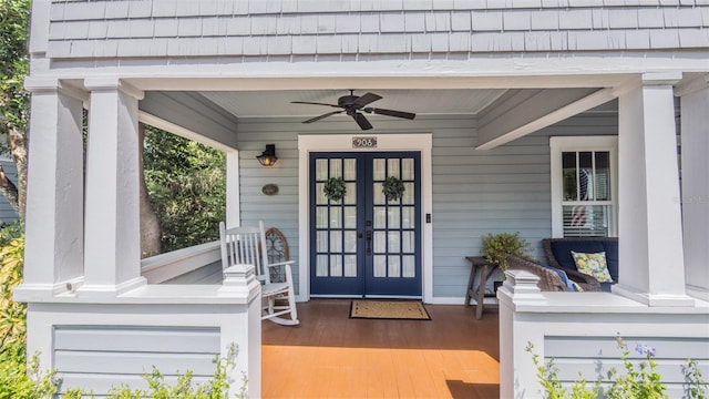 908 N Tremain St, Mount Dora, FL 32757 - entrance to property featuring a porch, ceiling fan, and french doors