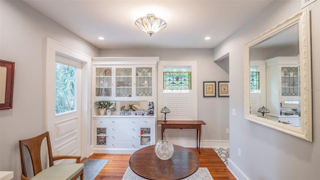 908 N Tremain St, Mount Dora, FL 32757 - sitting room with recessed lighting, baseboards, and wood finished floors