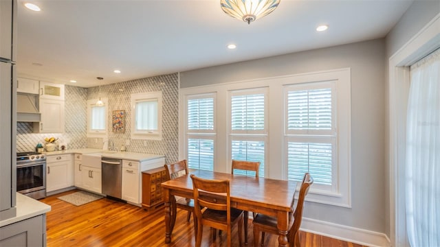 908 N Tremain St, Mount Dora, FL 32757 - kitchen featuring light countertops, appliances with stainless steel finishes, and a wealth of natural light