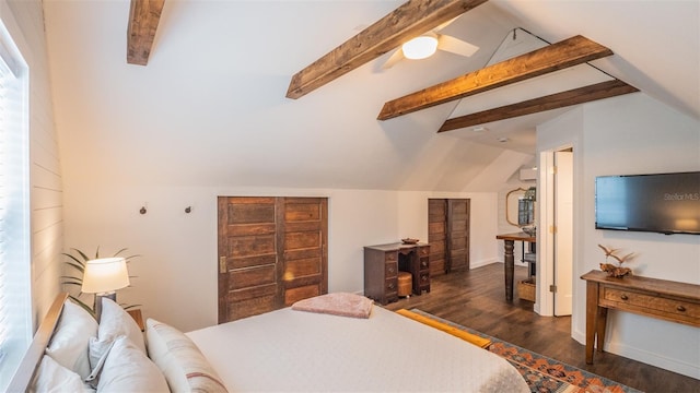 908 N Tremain St, Mount Dora, FL 32757 - bedroom with baseboards, lofted ceiling with beams, and wood finished floors