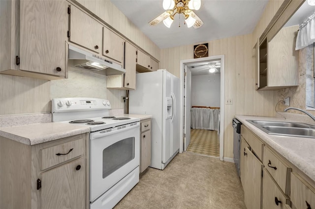 kitchen with a sink, a ceiling fan, white appliances, light countertops, and under cabinet range hood