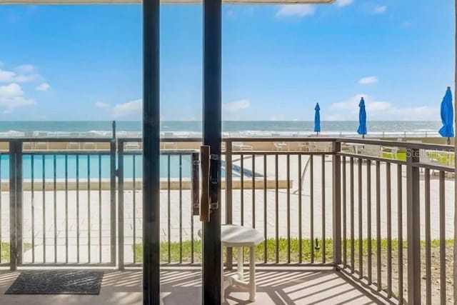 4435 S Atlantic Ave Unit 114, Ponce Inlet, FL 32127 - balcony featuring view of water and beach