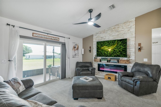 living area featuring carpet floors, a ceiling fan, vaulted ceiling, and visible vents