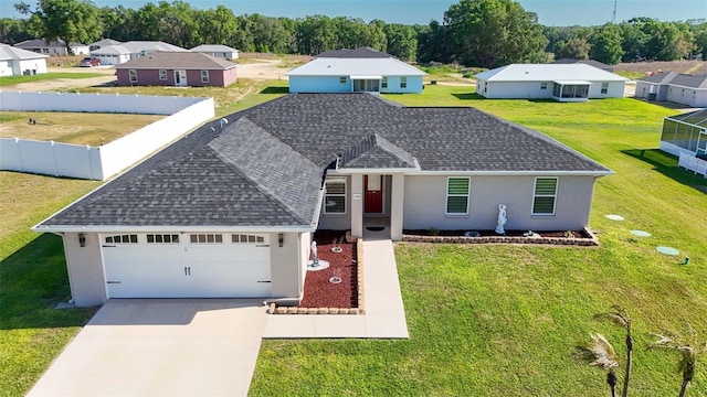 single story home with a shingled roof, a residential view, concrete driveway, stucco siding, and a garage