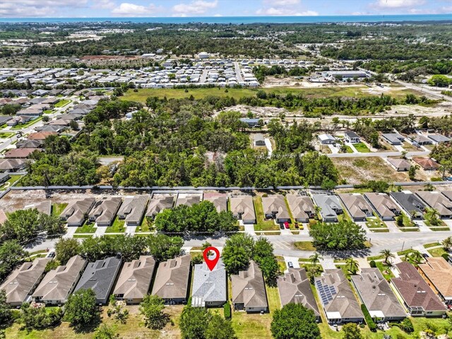 14820 Potterton Cir, Hudson, FL 34667 - aerial view of property and surrounding area with nearby suburban area