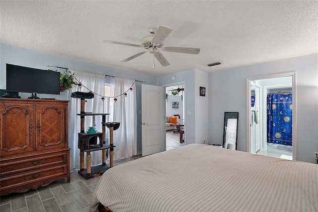 38 Townhill Dr, Eustis, FL 32726 - bedroom with a textured ceiling, visible vents, and ceiling fan