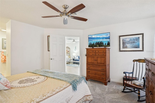 732 Ramirez Ave, The Villages, FL 32159 - bedroom with visible vents, a ceiling fan, carpet, and baseboards