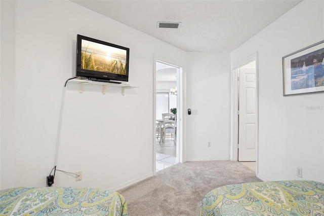 732 Ramirez Ave, The Villages, FL 32159 - carpeted bedroom with visible vents and baseboards