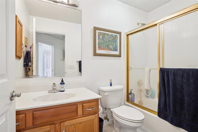 732 Ramirez Ave, The Villages, FL 32159 - full bath featuring vanity, bath / shower combo with glass door, and toilet