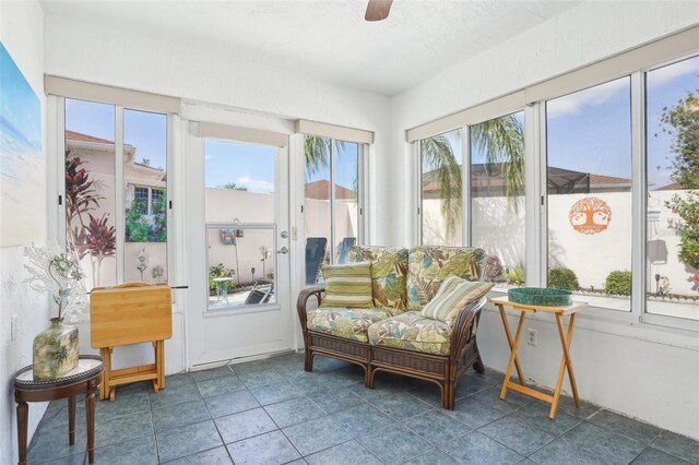 732 Ramirez Ave, The Villages, FL 32159 - sunroom featuring tile patterned floors