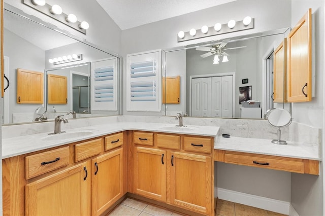 2120 Callaway Dr, The Villages, FL 32162 - bathroom featuring ceiling fan, tile patterned flooring, and a sink