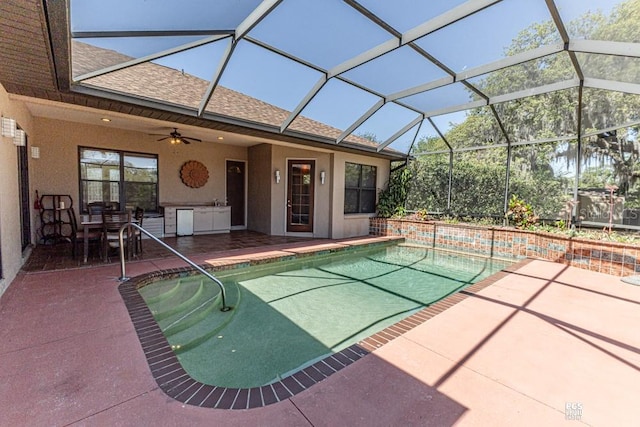 pool with a patio area, a lanai, and ceiling fan