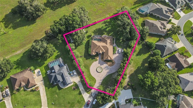 birds eye view of property with a residential view