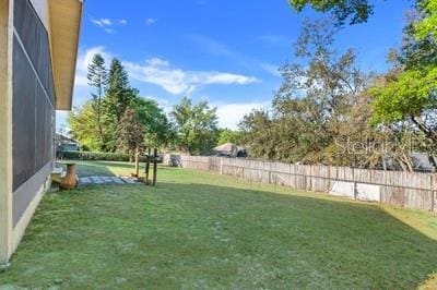 view of yard with fence