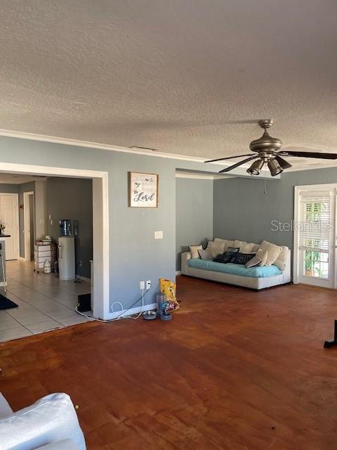 879 Little Bend Rd, Altamonte Springs, FL 32714 - bedroom featuring a textured ceiling, wood finished floors, crown molding, and a ceiling fan