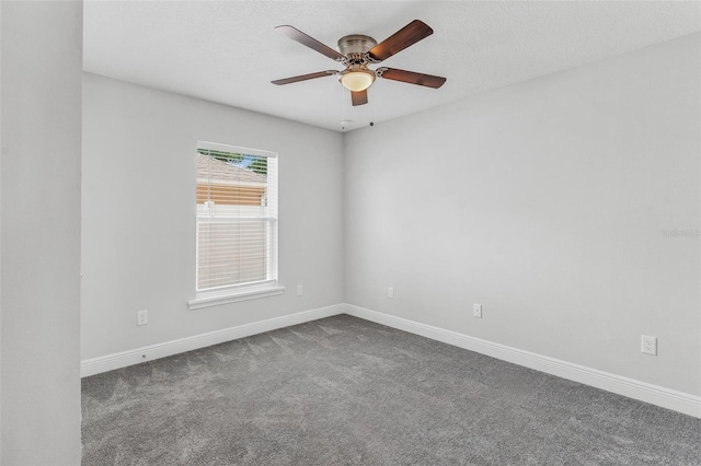 16380 SE 84th Ct, Summerfield, FL 34491 - empty room featuring baseboards, a ceiling fan, and dark colored carpet