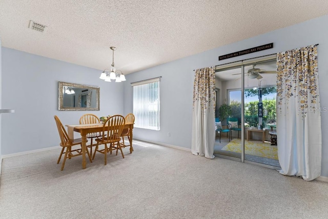 4386 Sambourne St, Clermont, FL 34711 - carpeted dining room with baseboards, visible vents, a textured ceiling, and a chandelier