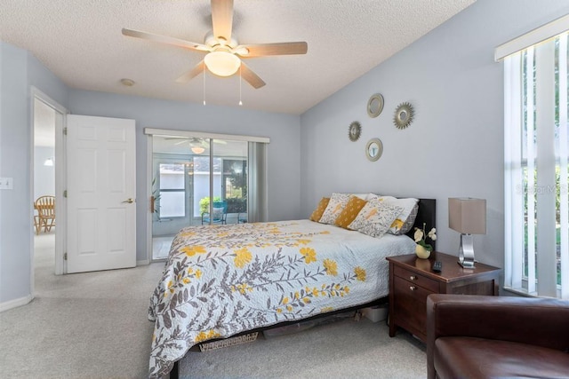 4386 Sambourne St, Clermont, FL 34711 - carpeted bedroom with ceiling fan, access to exterior, and a textured ceiling