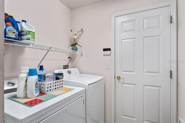 4386 Sambourne St, Clermont, FL 34711 - laundry room with laundry area and separate washer and dryer