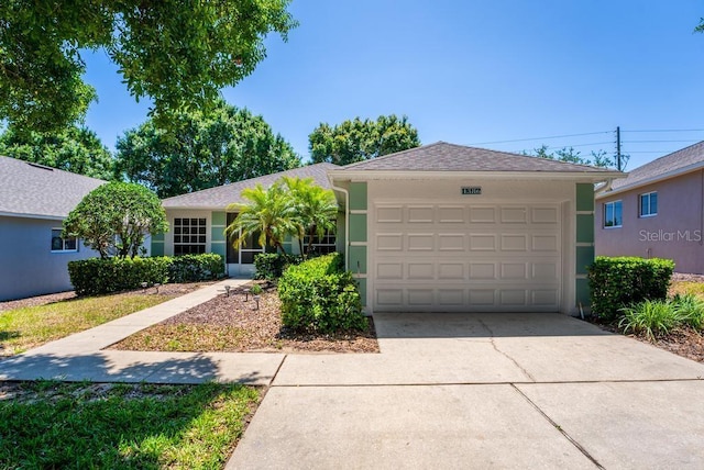 4386 Sambourne St, Clermont, FL 34711 - ranch-style home featuring stucco siding, concrete driveway, and a garage