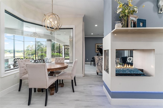 1111 Myrtle Breezes Ct, Fruitland Park, FL 34731 - dining space featuring crown molding, a chandelier, baseboards, and recessed lighting