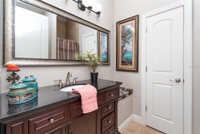 1111 Myrtle Breezes Ct, Fruitland Park, FL 34731 - bathroom featuring vanity, baseboards, and tile patterned floors